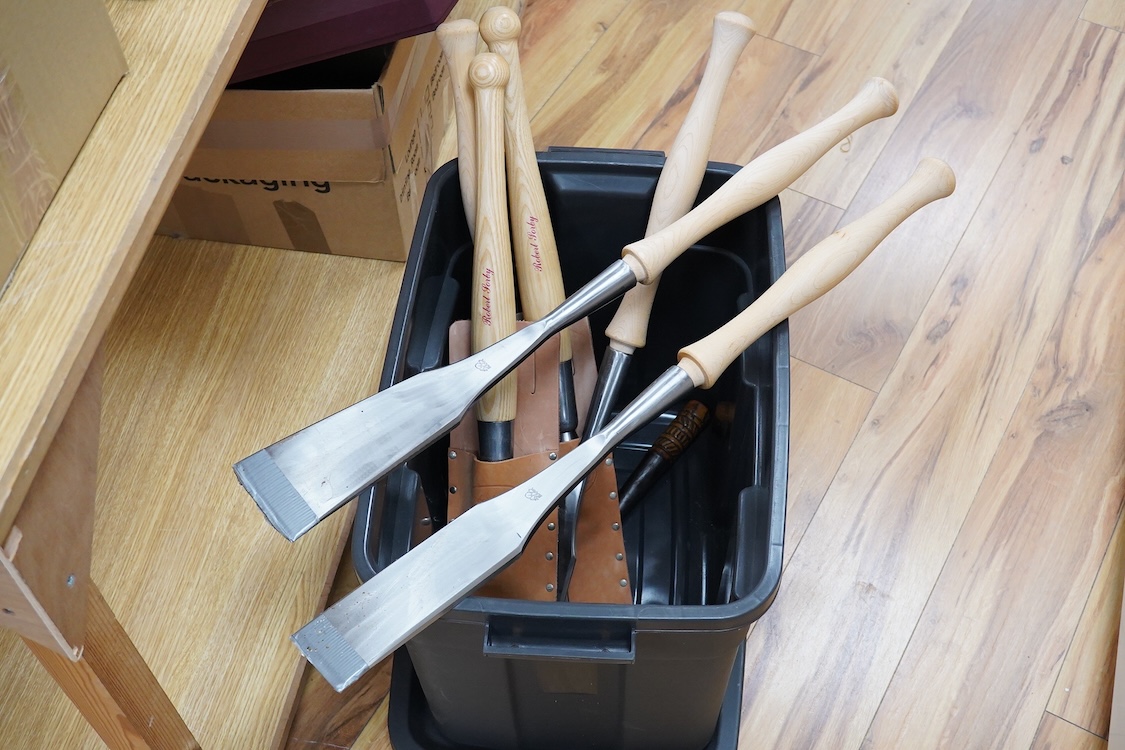 Seven timber framing chisels and slicks by Robert Sorby, Barr of Idaho U.S.A., etc. including two Sorby chisels in leather pouches, largest 86mm, a set of four Barr chisels, and another